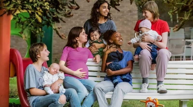 A still from the film Young Mothers showing a group of teenage mums and their babies