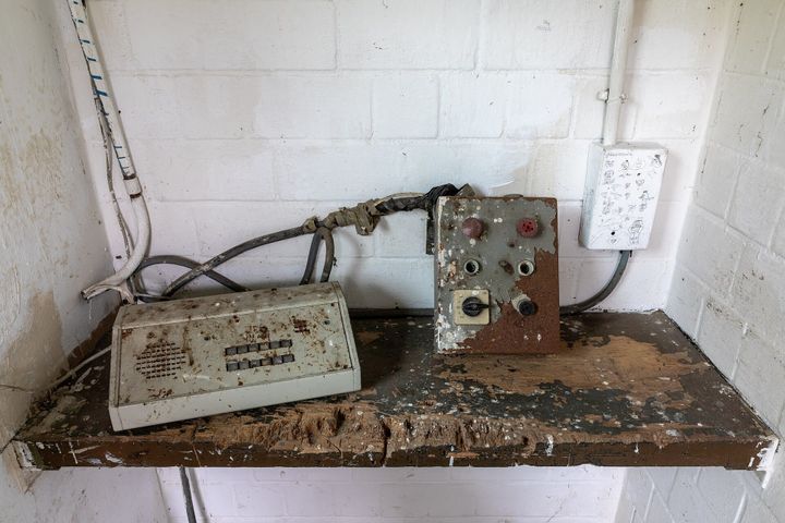 Abandoned and broken old electronic communication equipment.