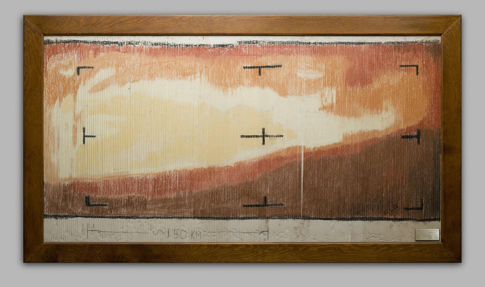 The first close-up of Mars, colored by hand: JPL engineers pasted strips of Mariner 4’s raw numbers and shaded them with pastels, faster than the computer could render the image, July 1965. Credit: NASA/JPL-Caltech.