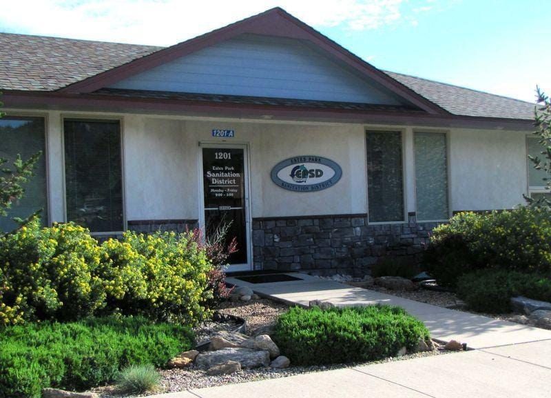 A building with a sign on the front

Description automatically generated