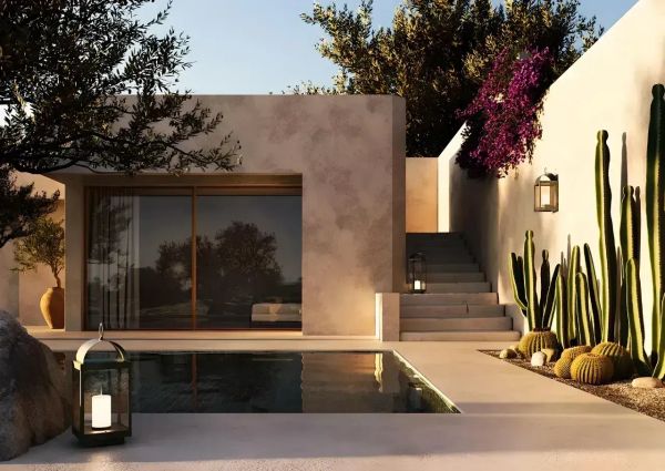 Jardin d’ombres et de lumière : l’élégance du laiton et du fer forgé