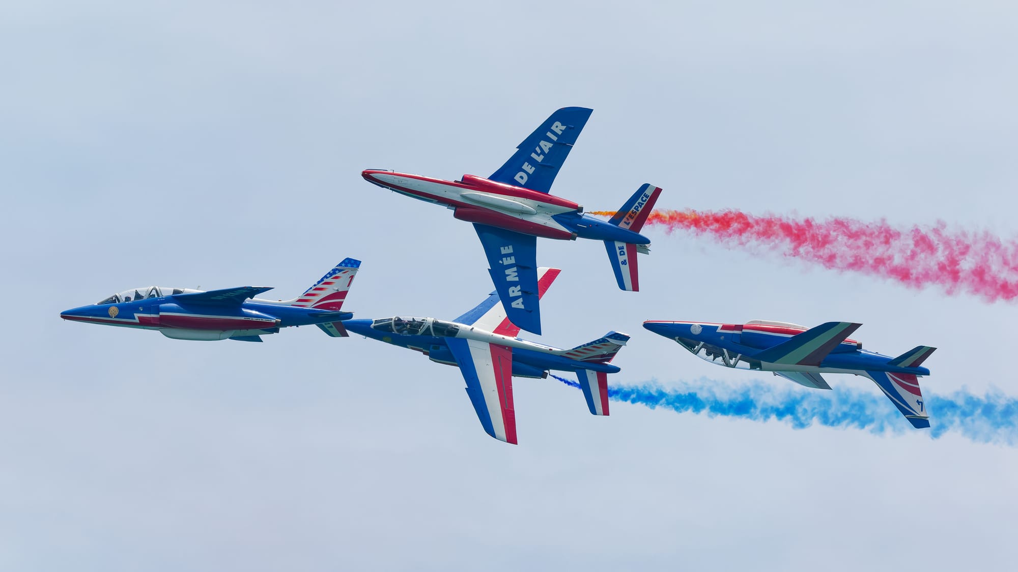 Jets from the Patrouille de France aerobatic team soar over Ocean City, Maryland