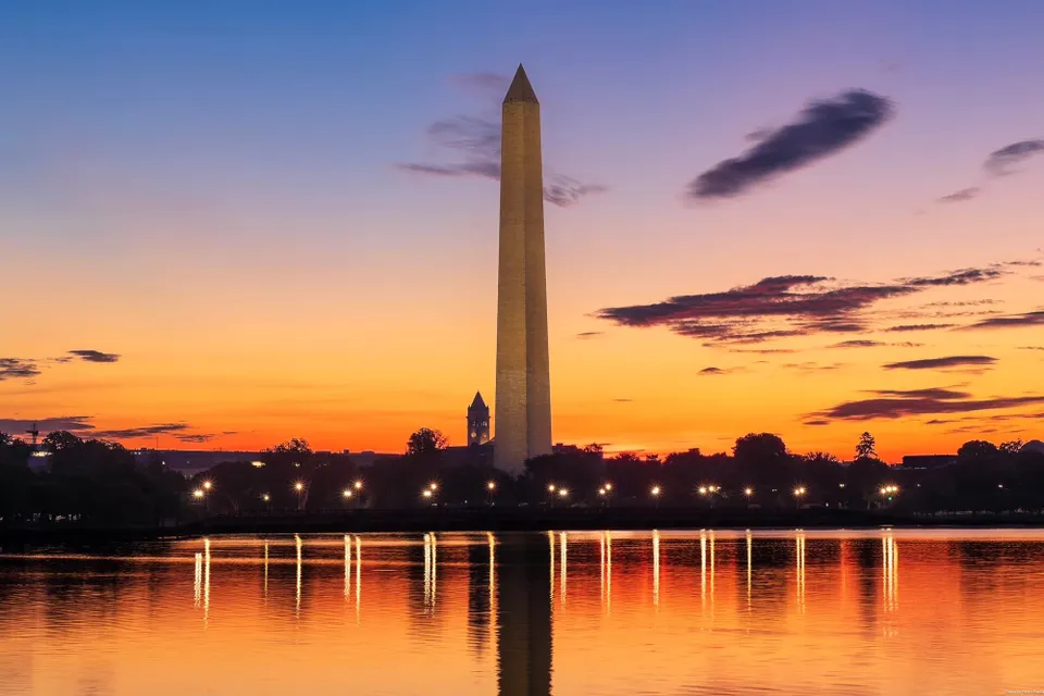 Colorful dawn skies reflecting off the Tidal Basin in front of the Washington Monument on Saturday. Photographed by Brian Paeth.