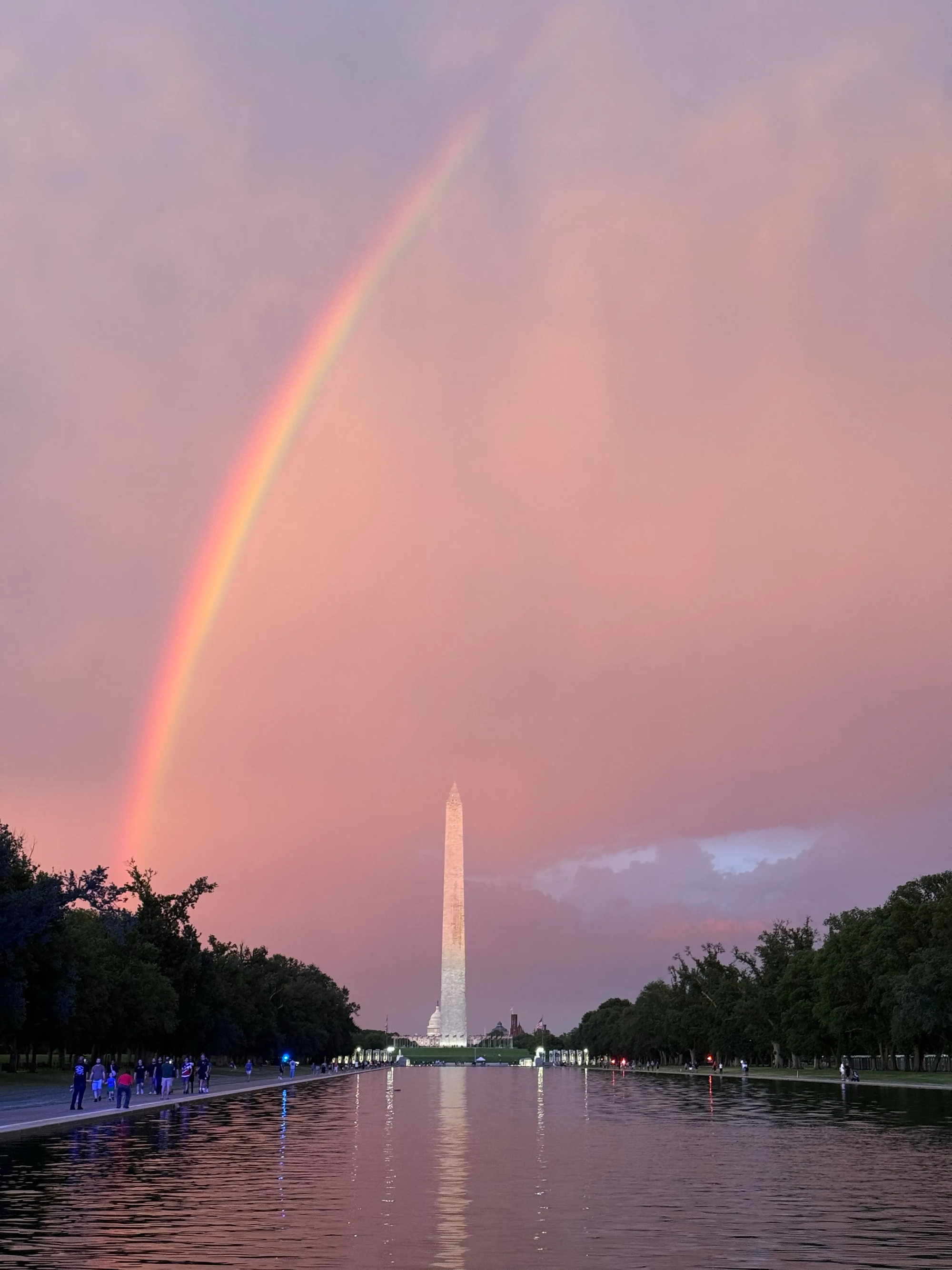 Sunset sky with rainbow over the Washington Monument Friday