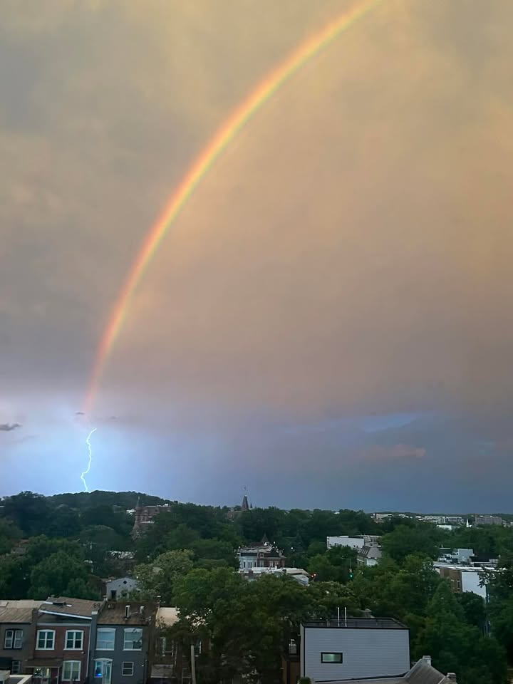 Lightning extends from a rainbow in NE DC