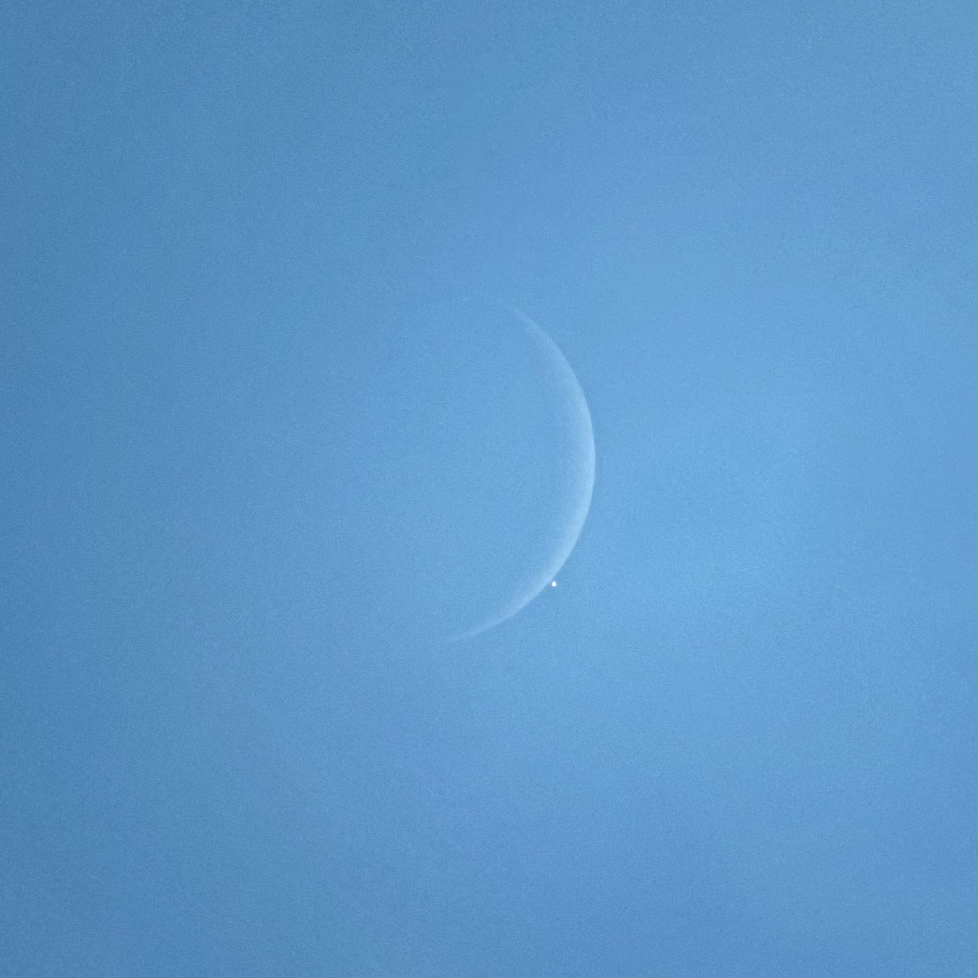 The moon and Venus as viewed from Reston on Wednesday afternoon