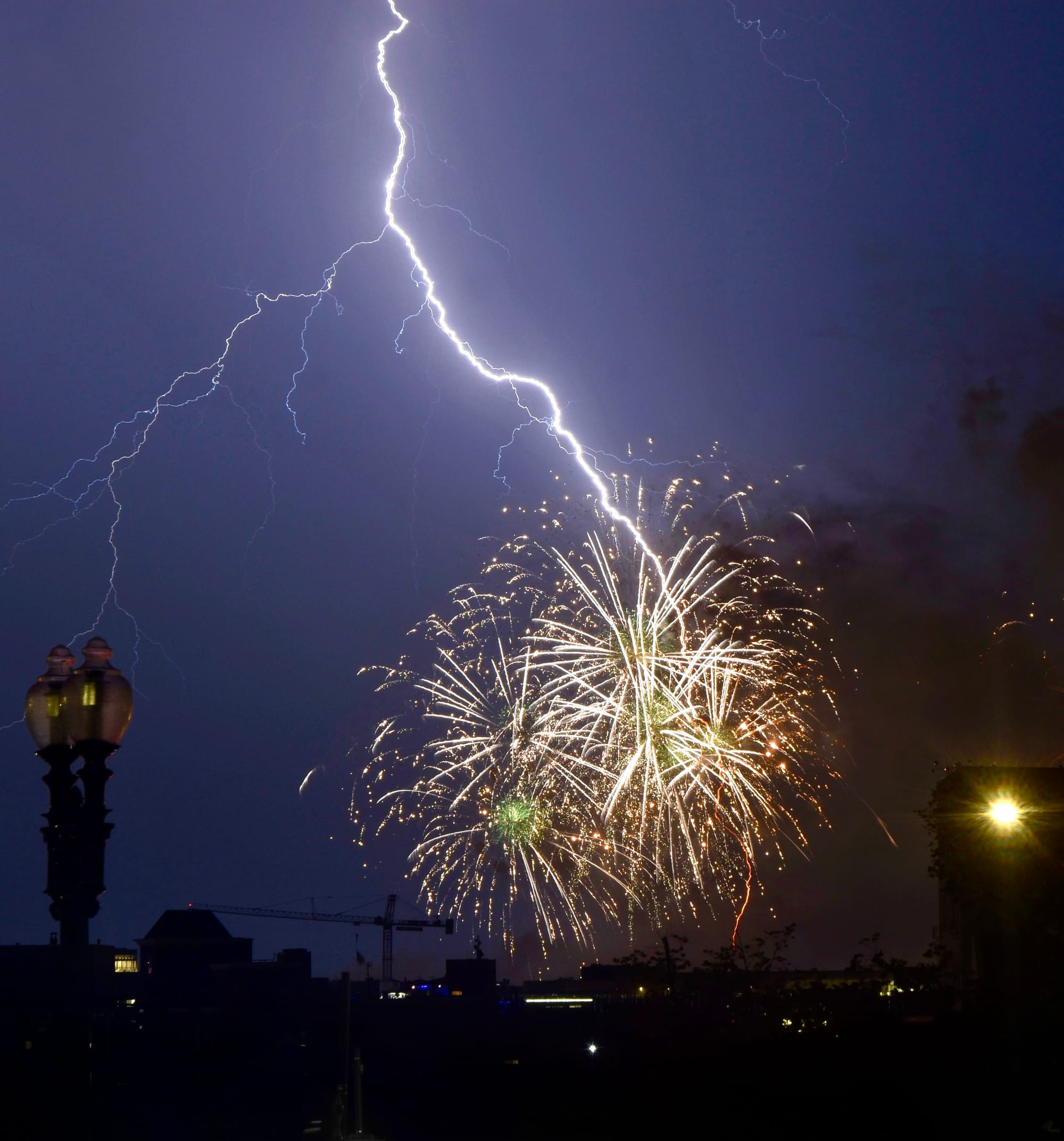 Photo of lightning during Fourth of July fireworks in DC on July 5, 2026.