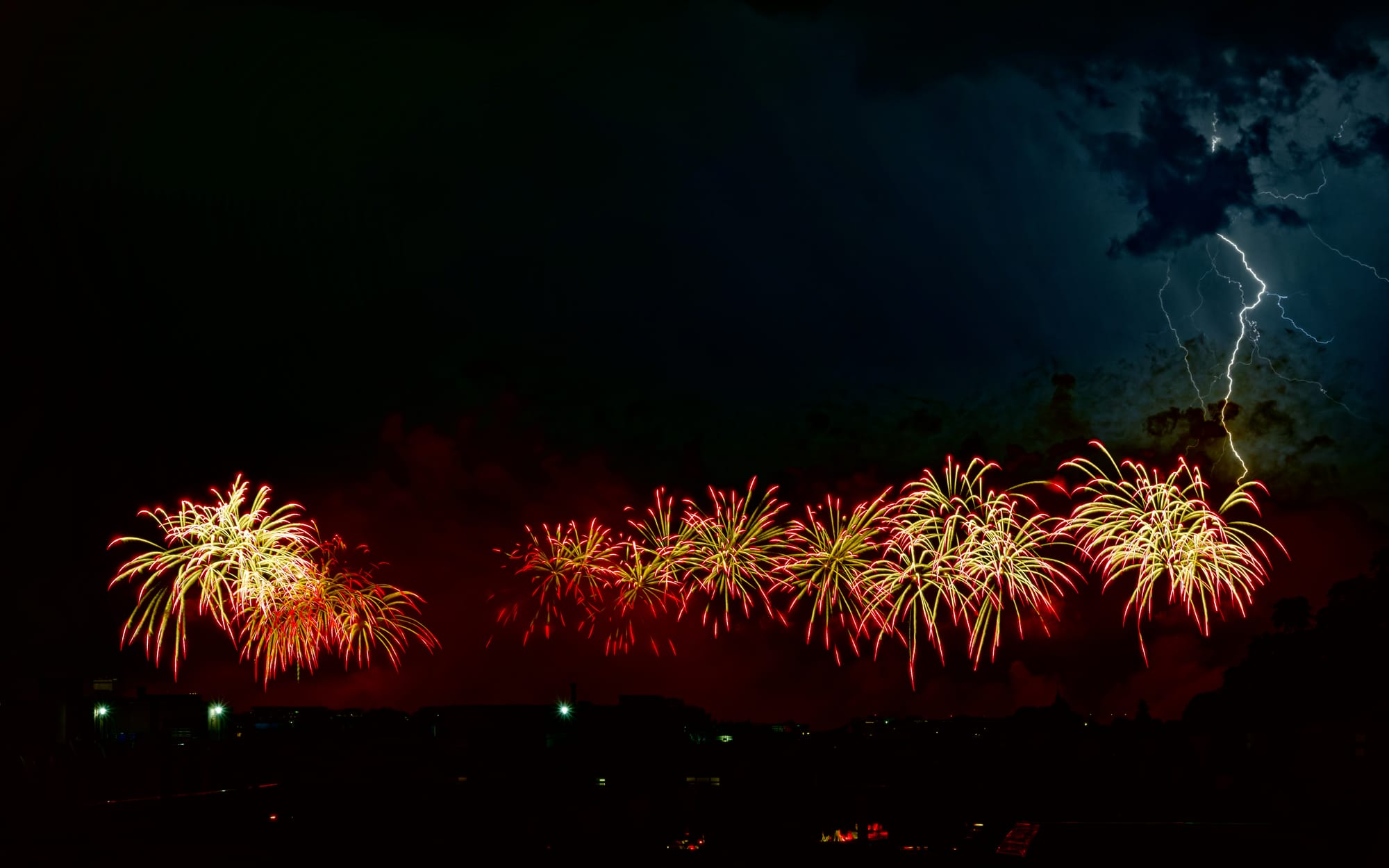 Photo of lightning during Fourth of July fireworks in DC on July 5, 2026.
