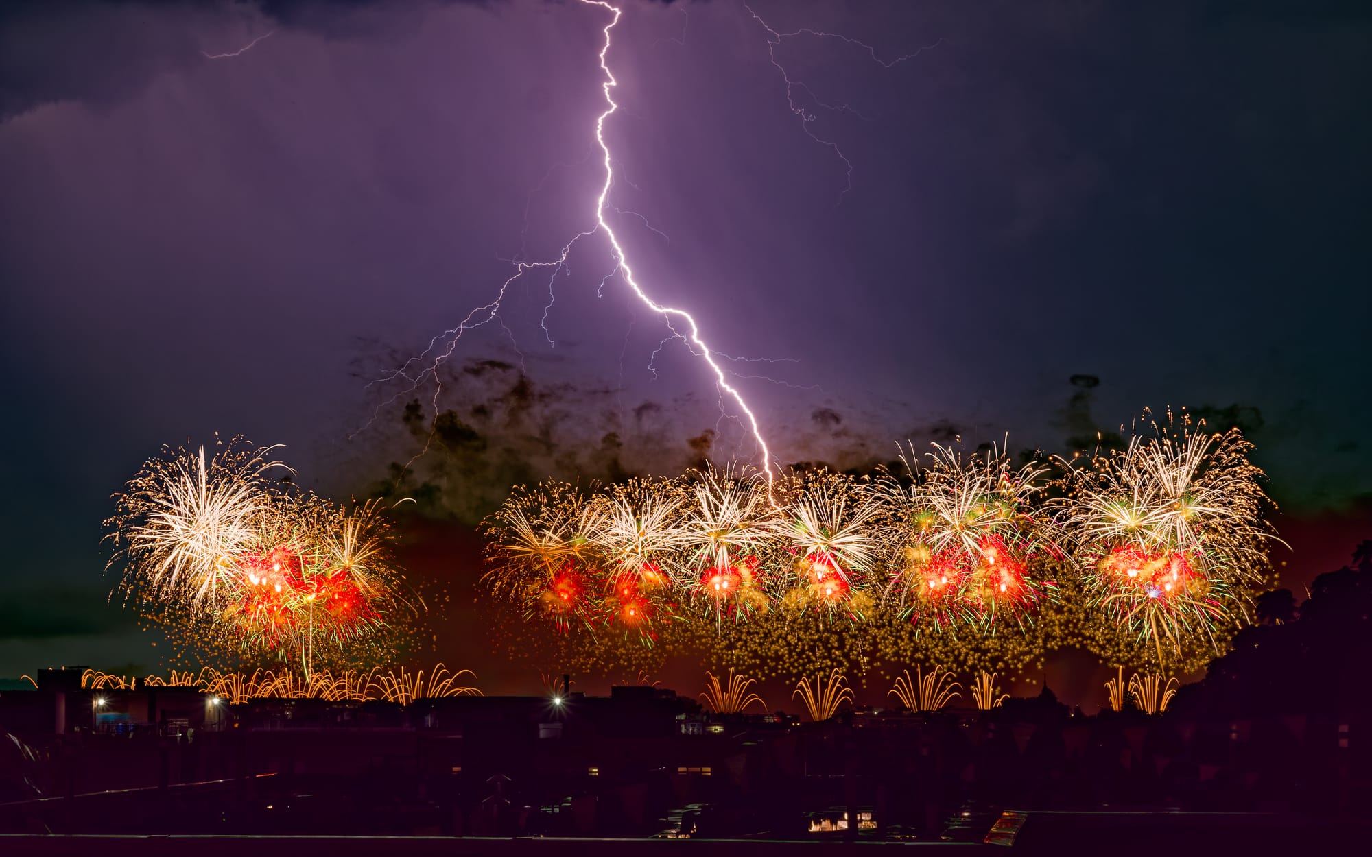 Photo of lightning during Fourth of July fireworks in DC on July 5, 2026.