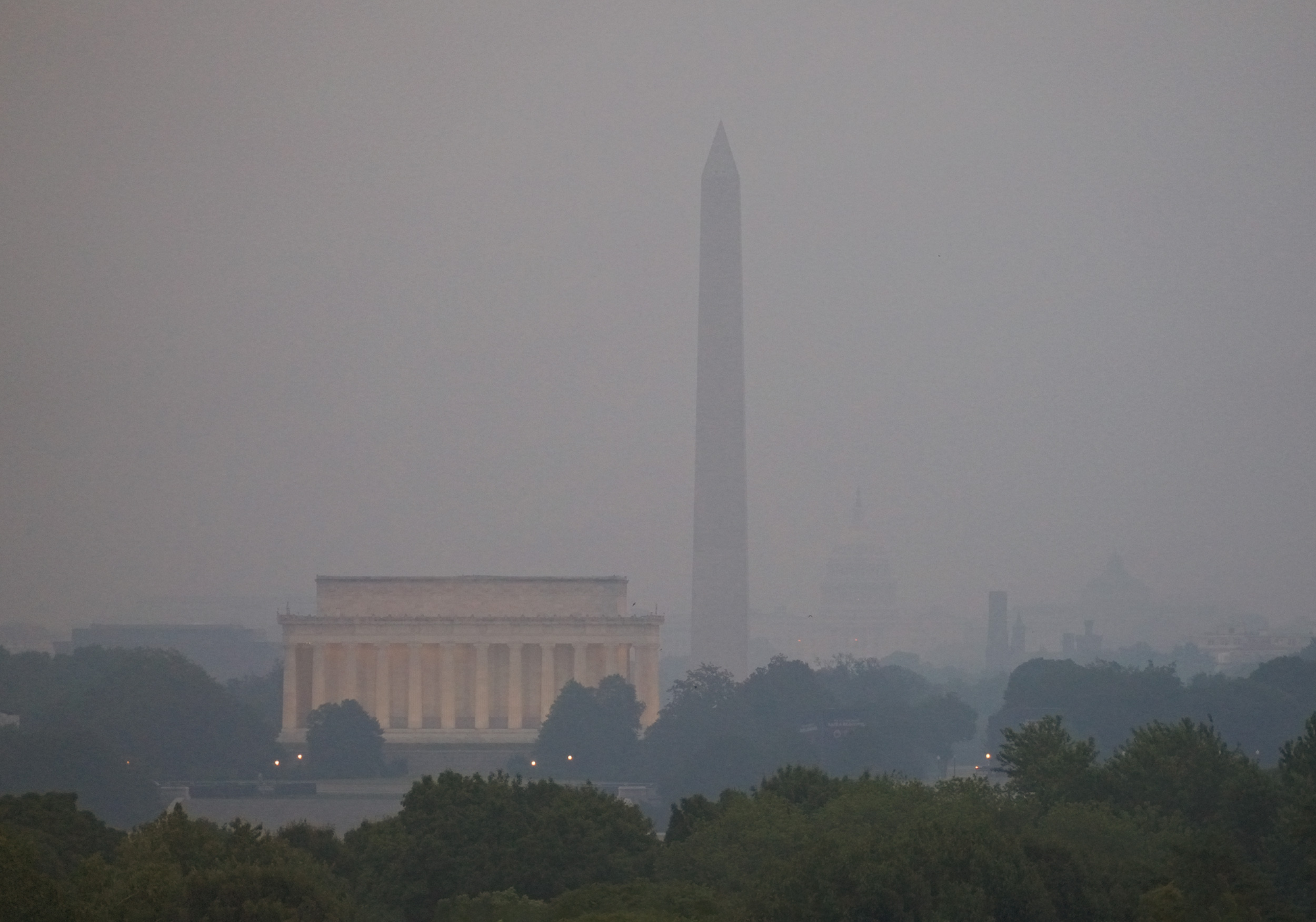 Photo showing smoke over DC Saturday morning
