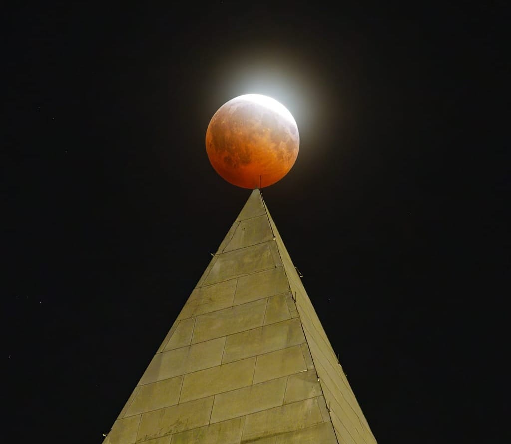 Photos: Clouds part and make way for deep lunar eclipse