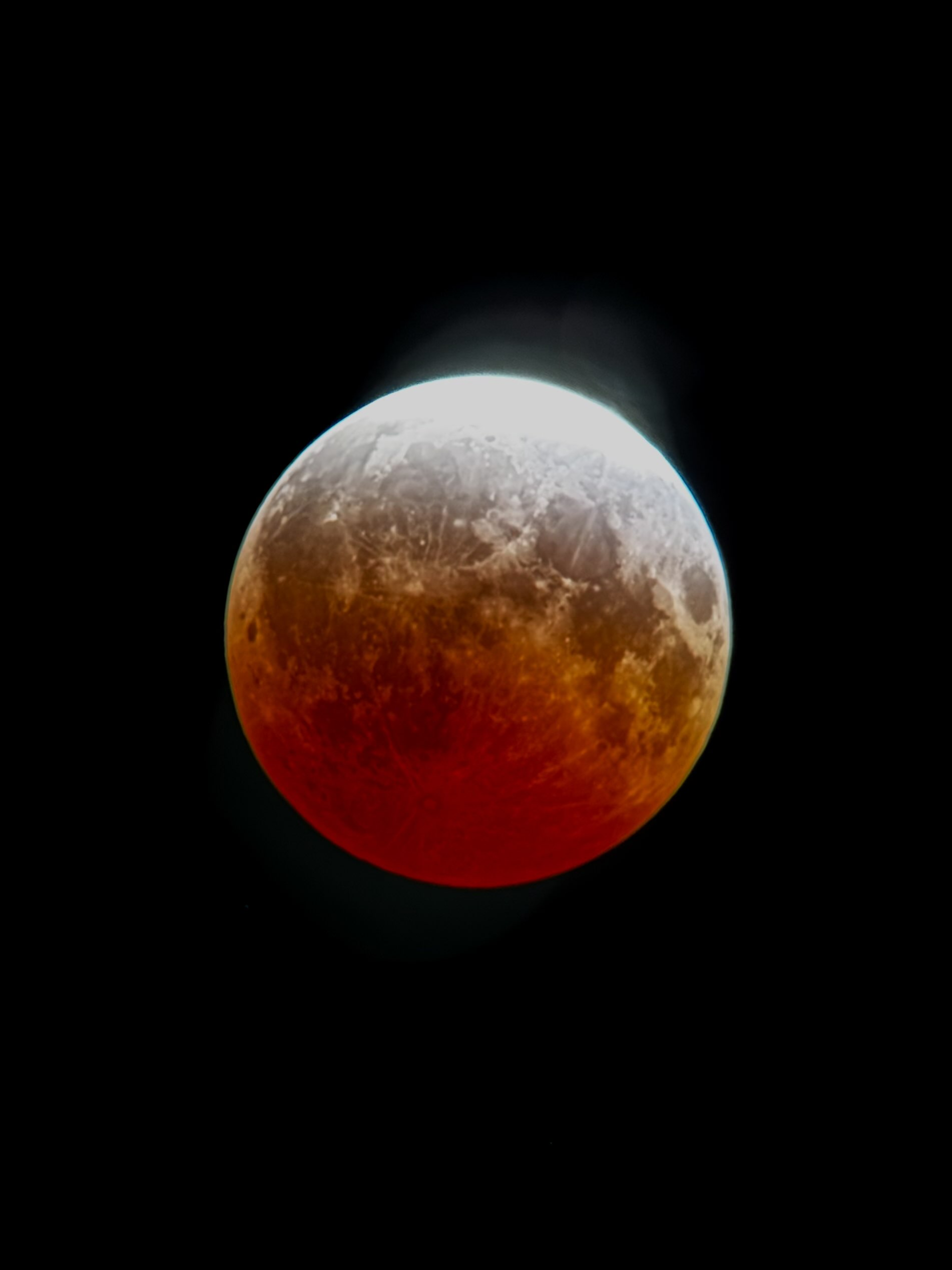 The deep lunar eclipse Thursday night photographed from Longmont, Colorado.