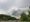 Dark cloud over interstate 270 and highway sign near center of the screen