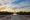 Sunrise reflecting off the Reflecting Pool in front of the Washington Monument.
