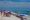 People sitting out on the beach