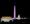 Lincoln Memorial, Washington Monument (lit up in USA flag colors) and the Capitol at night as seen from Virginia. 