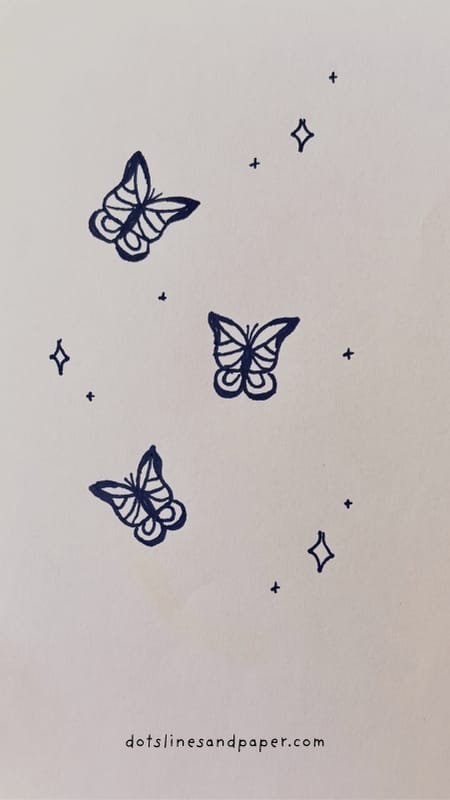 Easy and Cute Butterfly Drawing Ideas with stars and sparkles