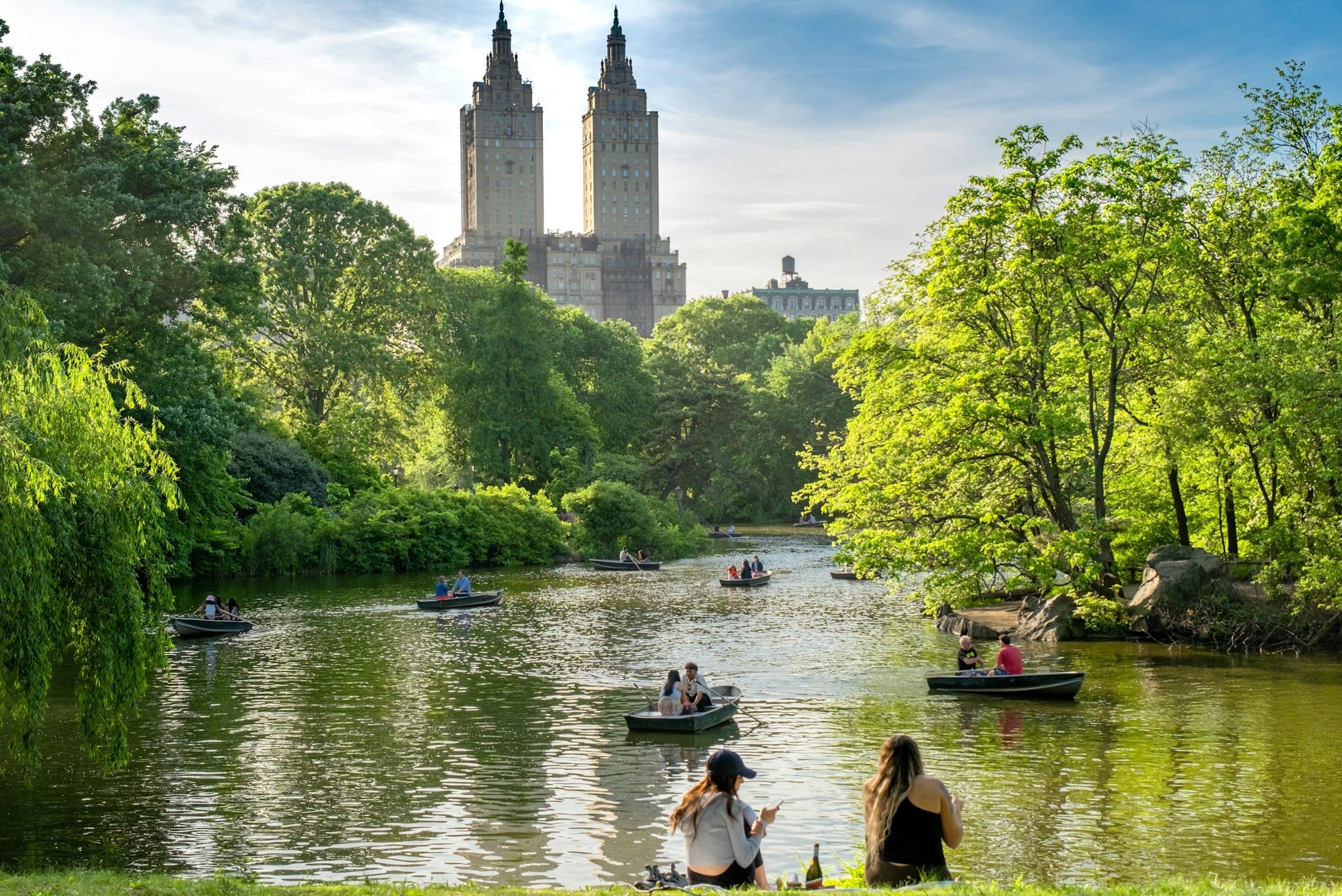 a group of people on small boats on a river