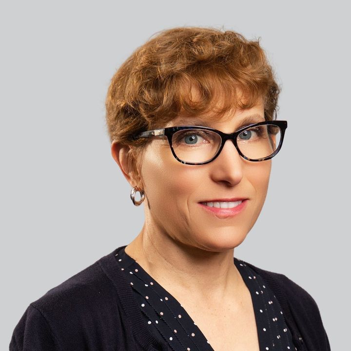 Photo of former NIH senior program officer Elizabeth Ginexi.