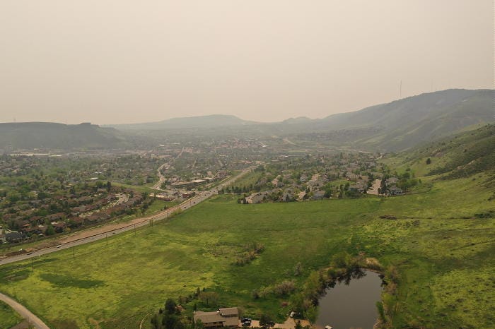 A view from the north end of the Golden valley. The grass is very green and the air is smoggy due to smoke from Canadian wildfires.