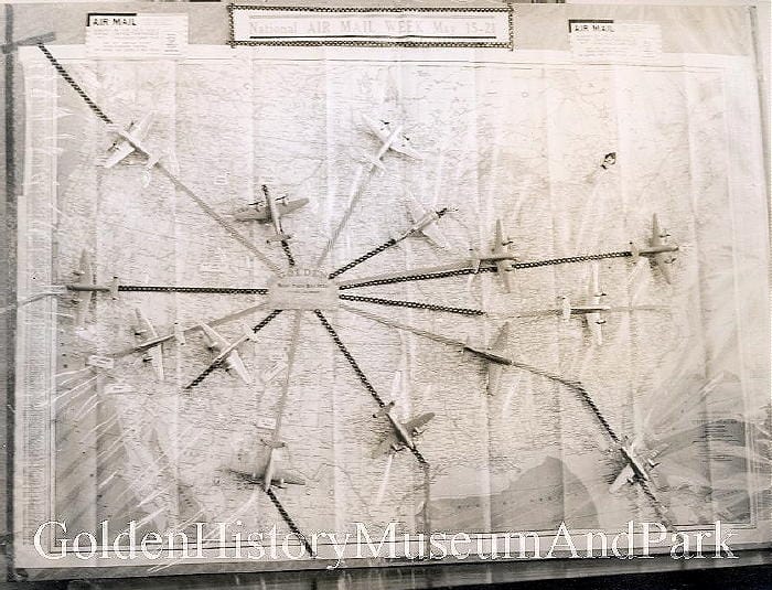 black and white photo of a map made to celebrate National Air Mail Week. Golden is marked at the center with model airplanes radiating out from Golden.