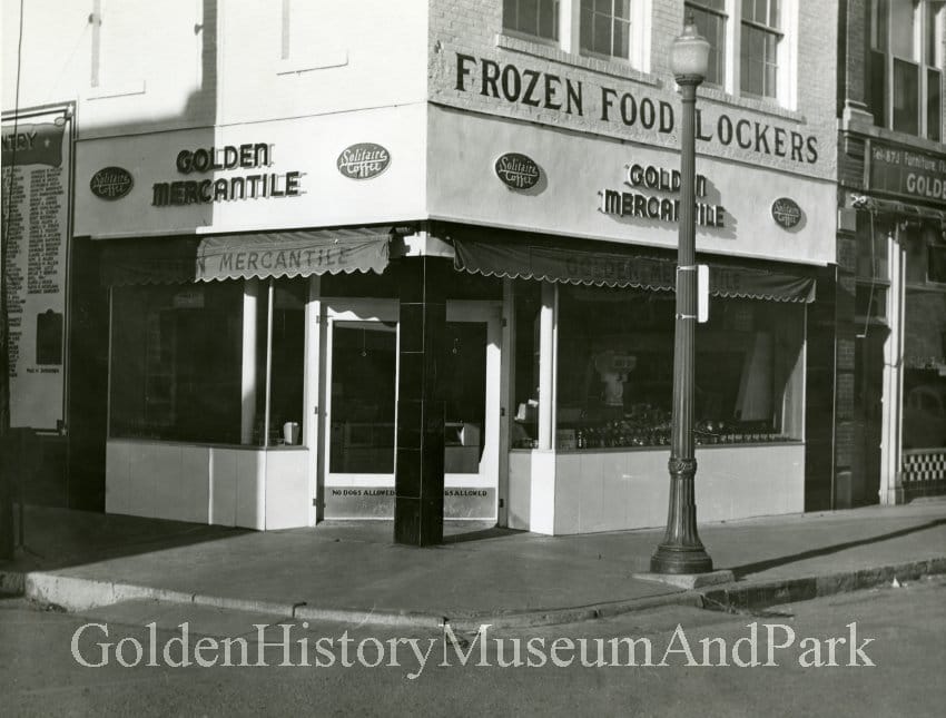 first floor view of the corner of the store, now painted, with sign saying FROZEN FOOD LOCKERS