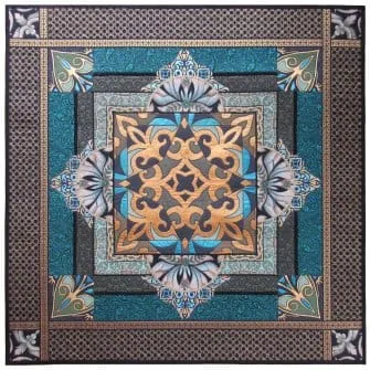 elaborate quilt in browns and blues