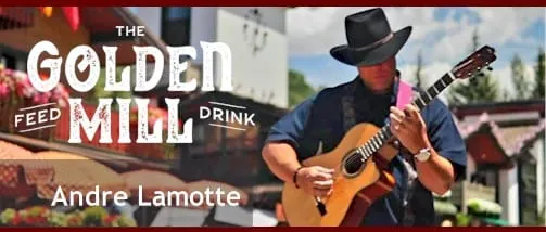 Andre Lamotte at the Golden Mill - man in hat playing on guitar