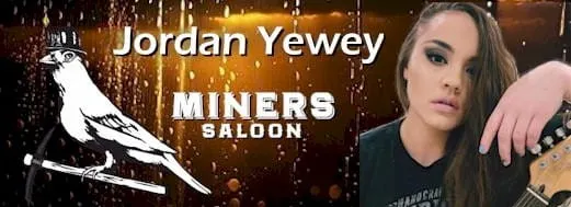 woman with long hair, hand on neck of guitar, Jordan Yewey Miners Saloon, canary wearing hardhat