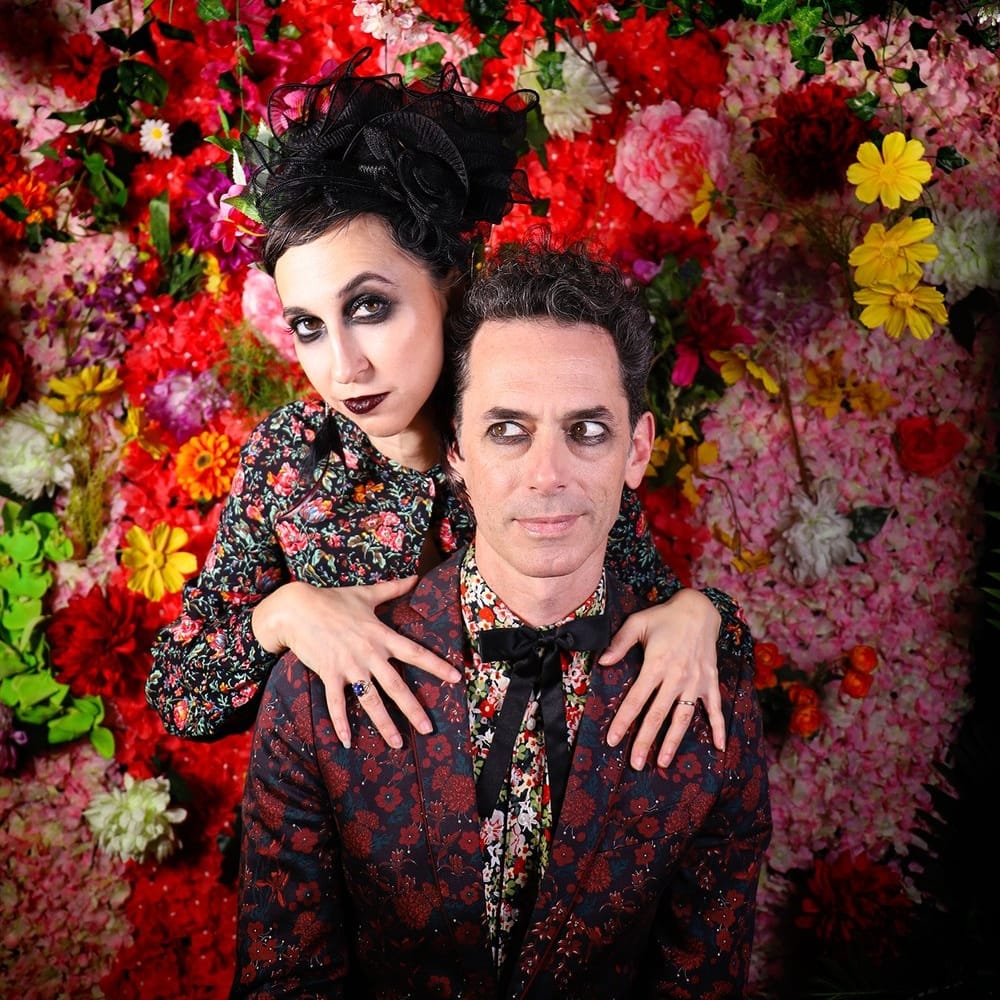 Charming Disaster in the flowers - Photo by Krys Fox