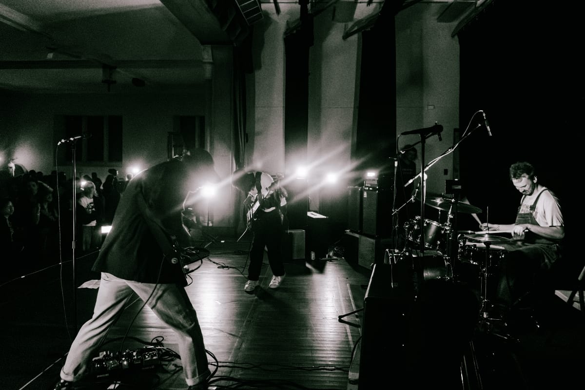 Black and white photo of Tiberius playing live. Photo by C. Daniels.