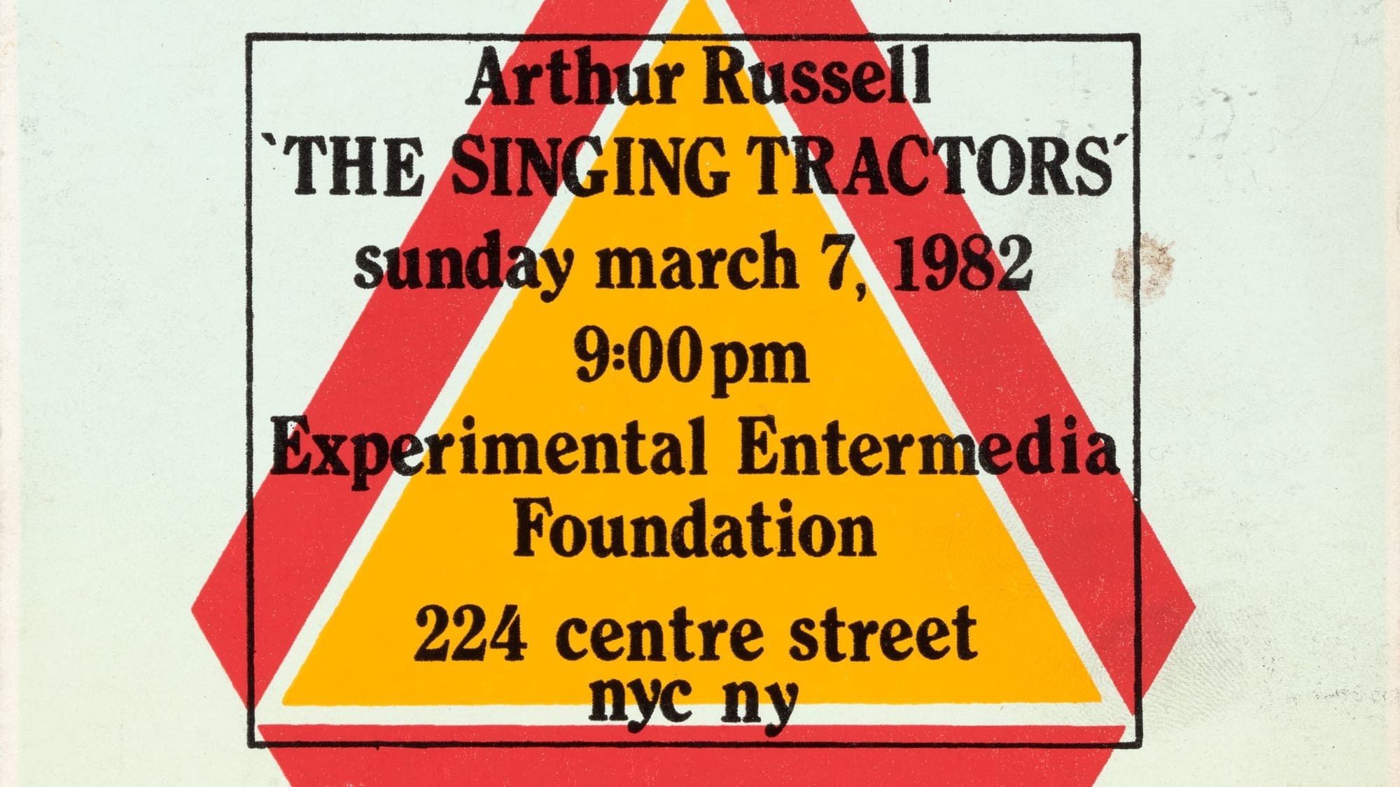 Flyer for Arthur Russell's "The Singing Tractors," Sunday March 7, 1982, 9:00 pm, Experimental Entermedia Foundation, 224 Centre Street, NYC. Black text over bold red and yellow overlapping triangles.