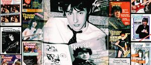 Paul Weller reads a copy of Trouser Press in a black-and-white portrait, ringed by color covers of the magazine featuring Jimmy Page, Lou Reed, Devo, Nick Lowe, and the Pretenders.