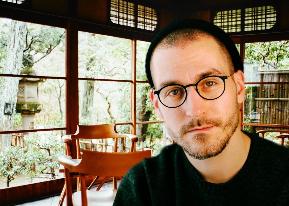 Craig Mod over a background photo of Sansuien Tea Room / Lobby, taken by Craig Mod.