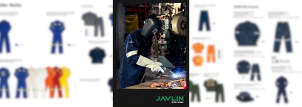 A welder in protective gear works with bright sparks flying. They are in a workshop setting, surrounded by equipment. The mood is focused and industrious.