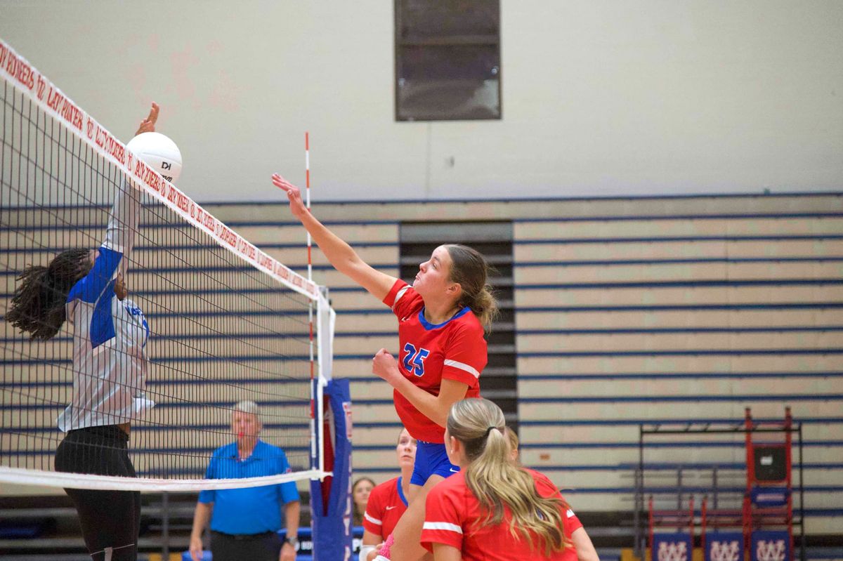 Warren wallops Wolverines