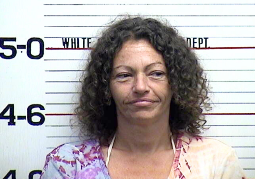 Woman Accused of Assault with Hand Saw