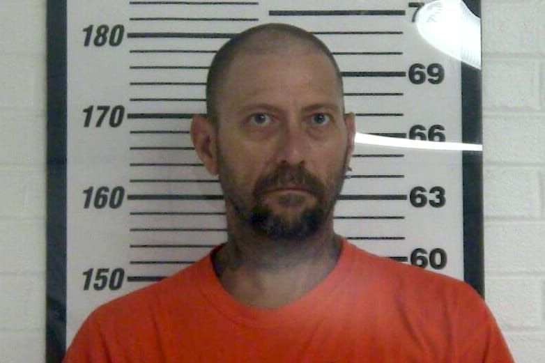 Outstanding warrants lead to new charges after driver flees