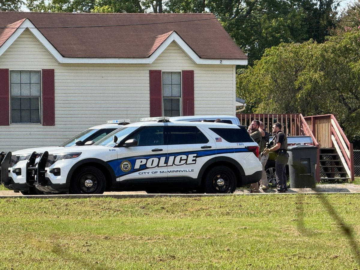 Police: Carroll fired first in deadly standoff