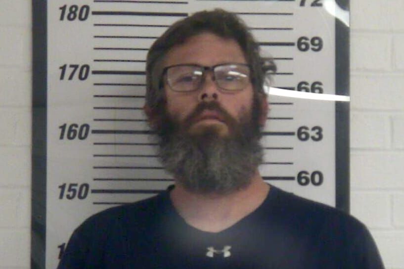 Father charged after allegedly choking son unconscious