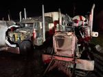 Explosion destroys two semis