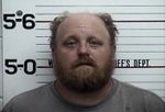 Horns, Profanities and a Harassment Charge
