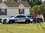 Police: Carroll fired first in deadly standoff