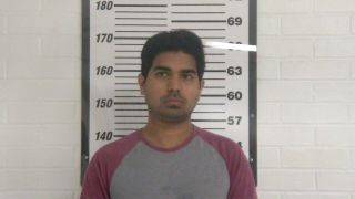 Store clerk fires at customer
