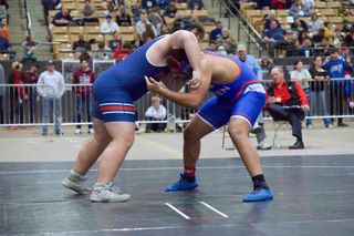 WCHS wrestling storms through season opener