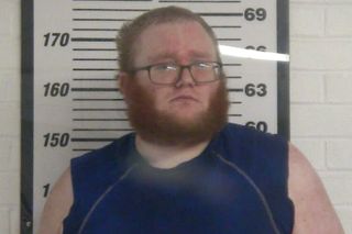 Travis charged with assaulting mother, stepfather