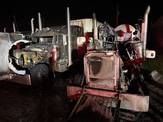 Explosion destroys two semis