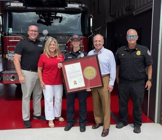 AEMT Firefighter Jade Callister Honored With Copy of First Responders Law