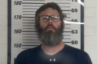 Father charged after allegedly choking son unconscious