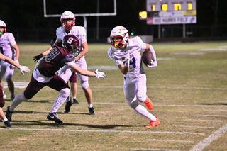 Warriors overrun Pioneers, 48-7
